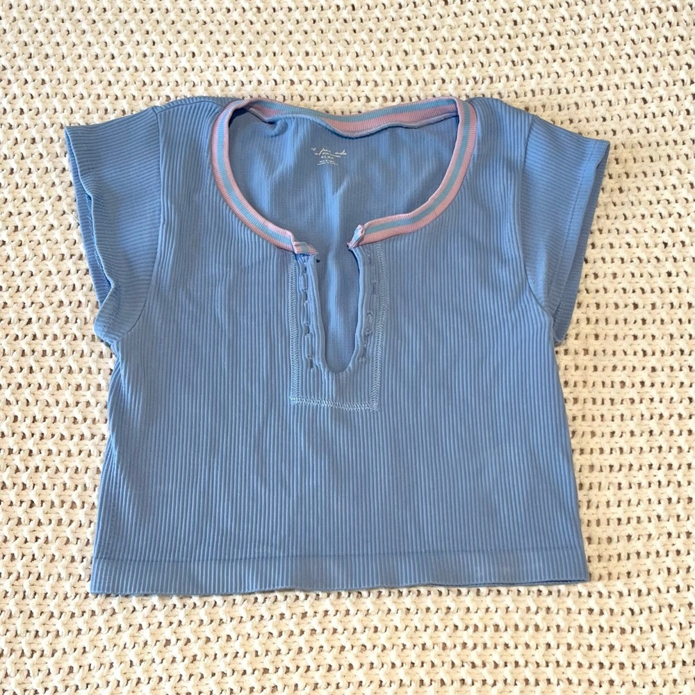 Urban Outfitters out from under top in blue with pink detailing